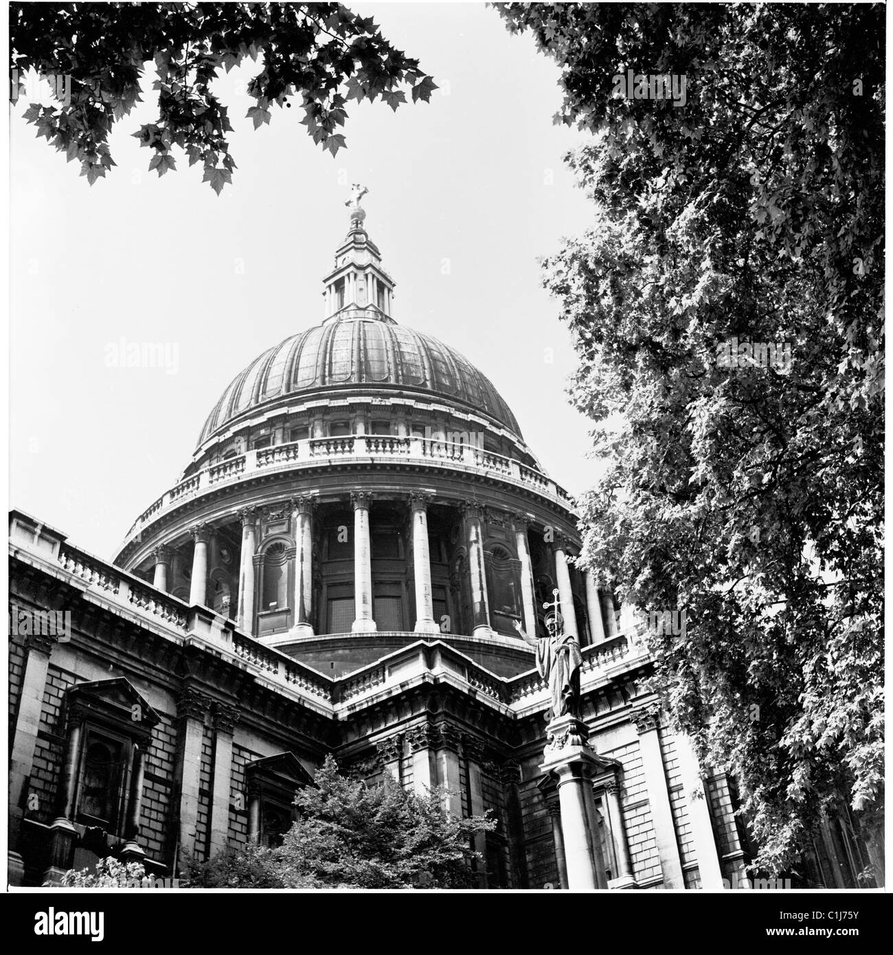1950s, view from below of St Paul's Cathedral, built after the Great Fire of London in 1710 in English baroque style by Sir Christopher Wren. Stock Photo