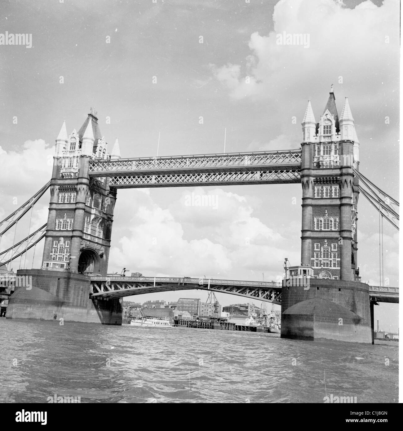 1950s, Tower Bridge, River Thames, a bascule & suspension bridge built in victorian gothic style to match the nearby Tower of London, opened in 1894. Stock Photo