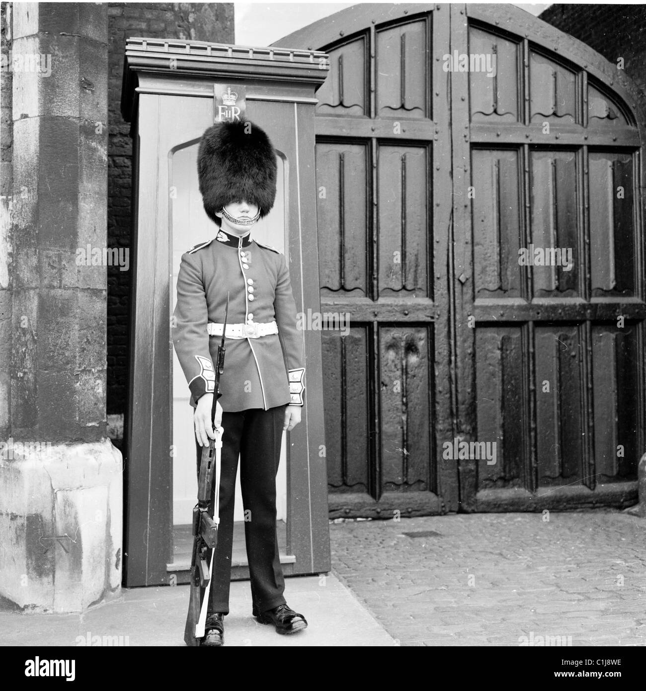 Post solider queens guards royal guard guard historical uniform male hires stock photography