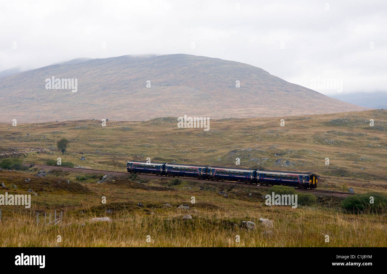 long shot of train , class 156 dmu , crossing rannoch moor , scotland Stock Photo