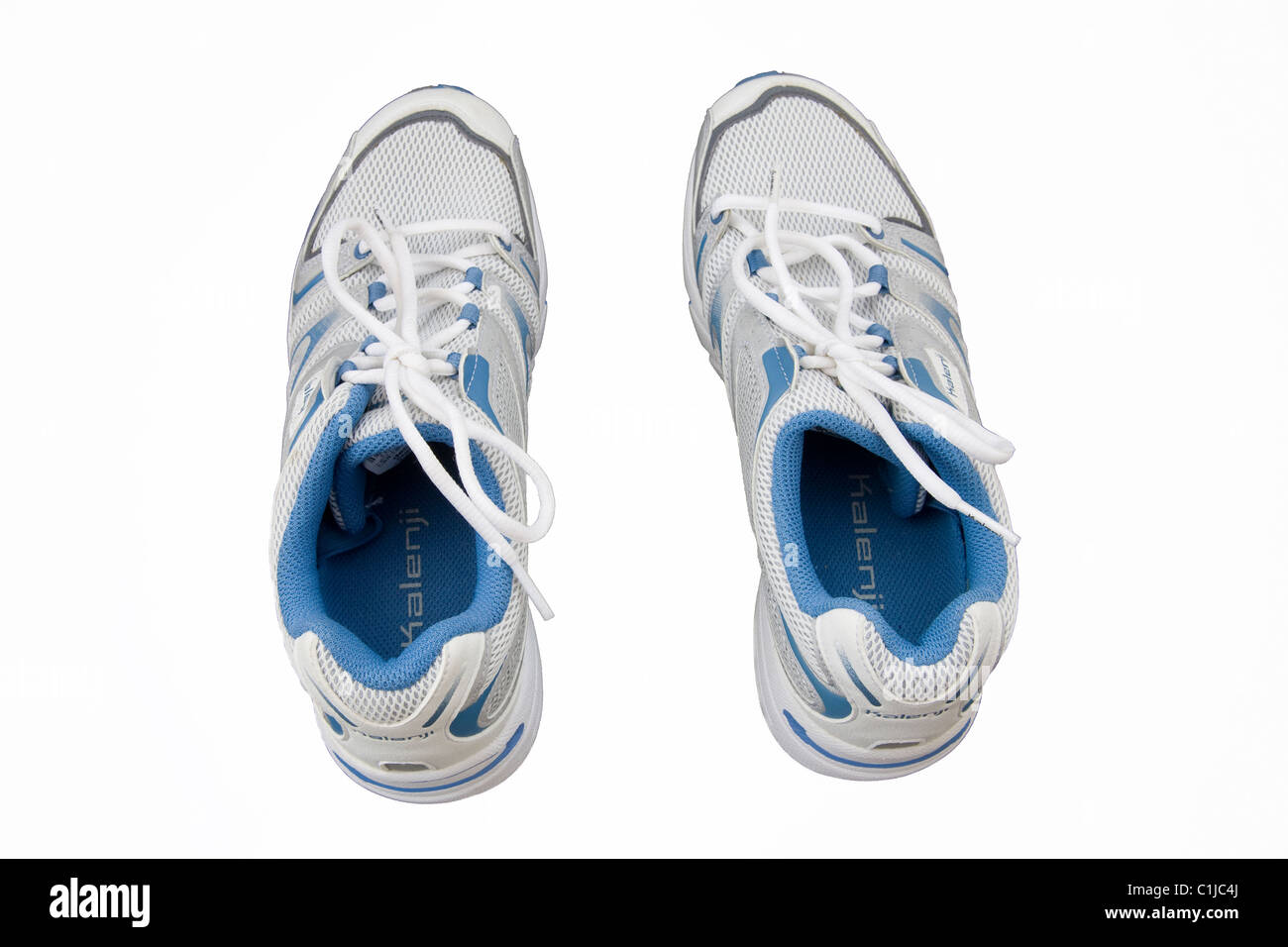 Cut out of a pair of woman's trainers on a white background Stock Photo ...