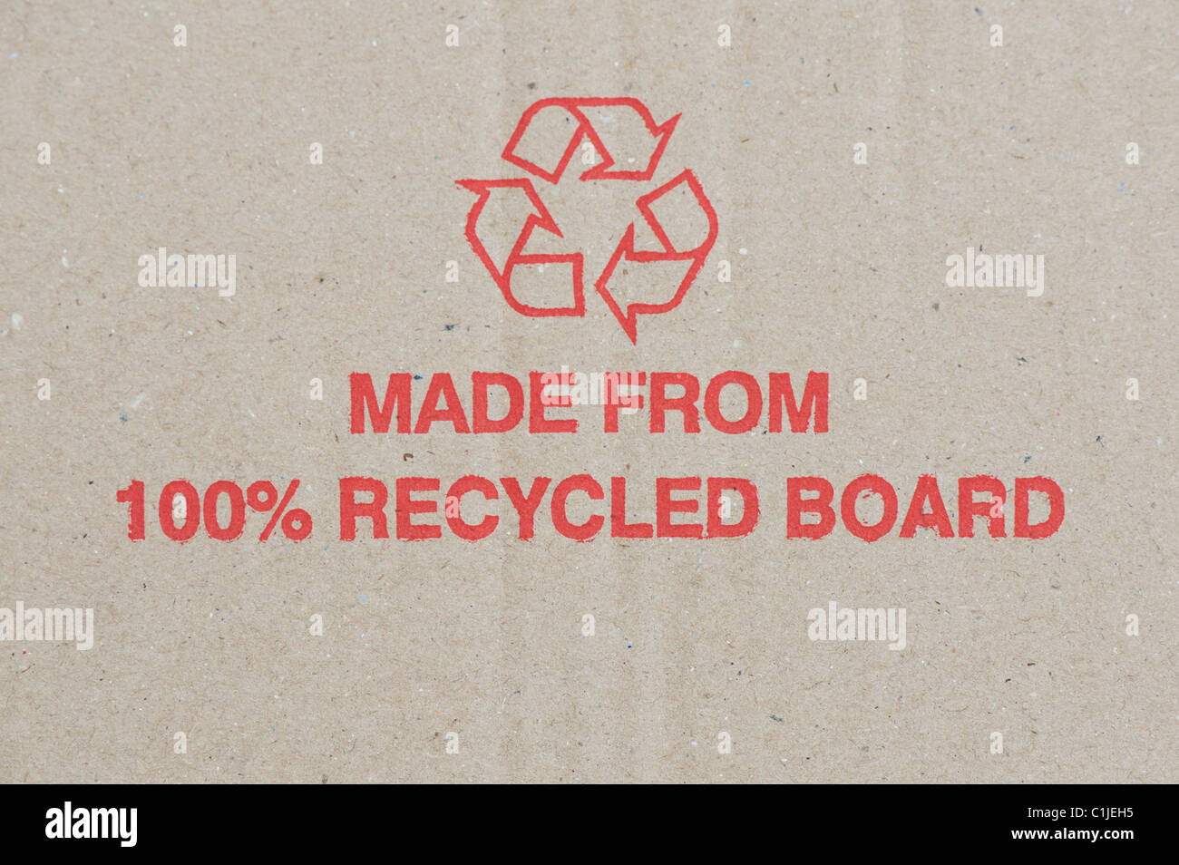 Made from100% recycled board. Printed sign on cardboard box Stock Photo