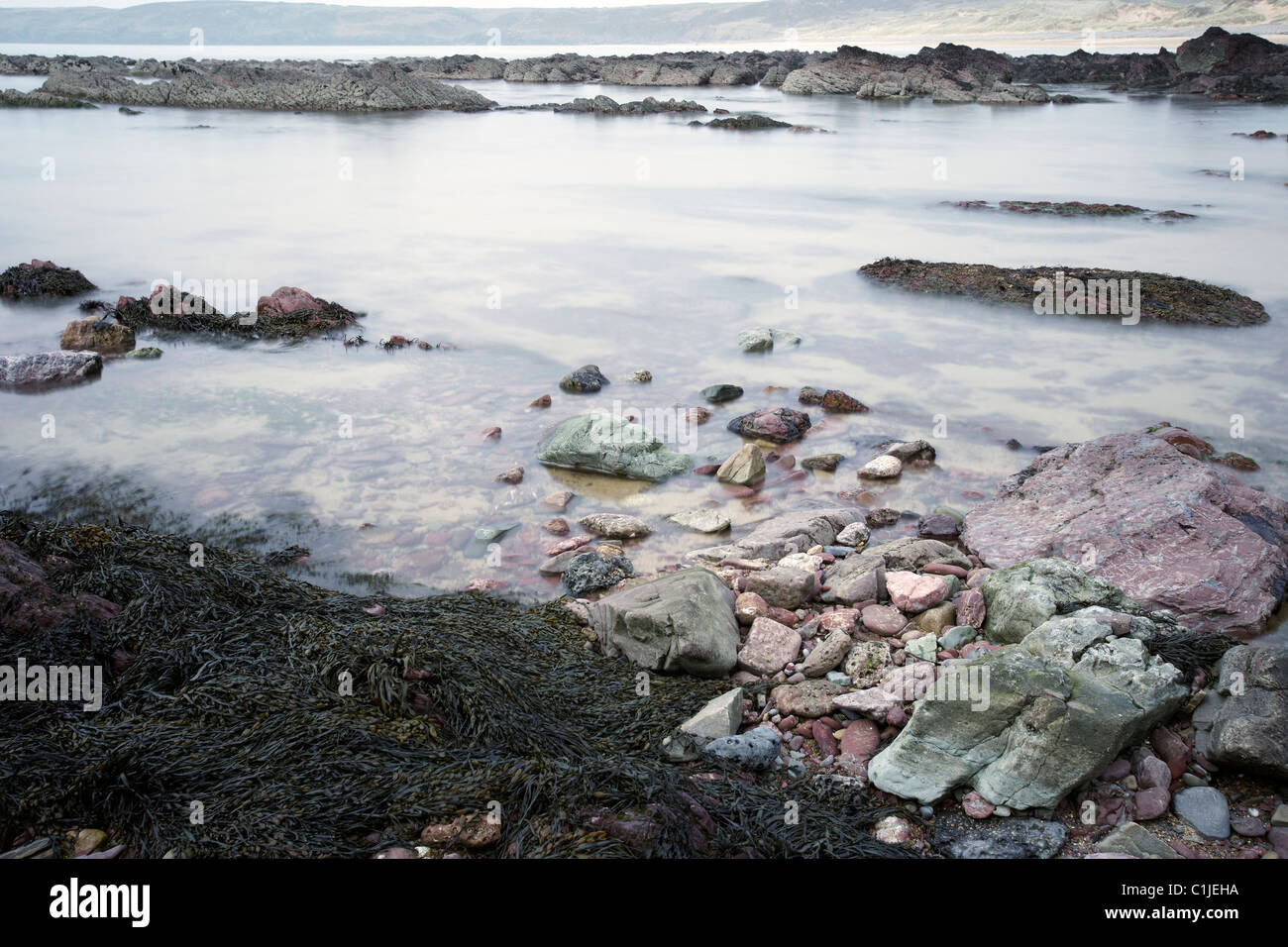 Rising tide on the Seashore, Freshwater West Bay, Pembrokeshire, Wales, UK Stock Photo