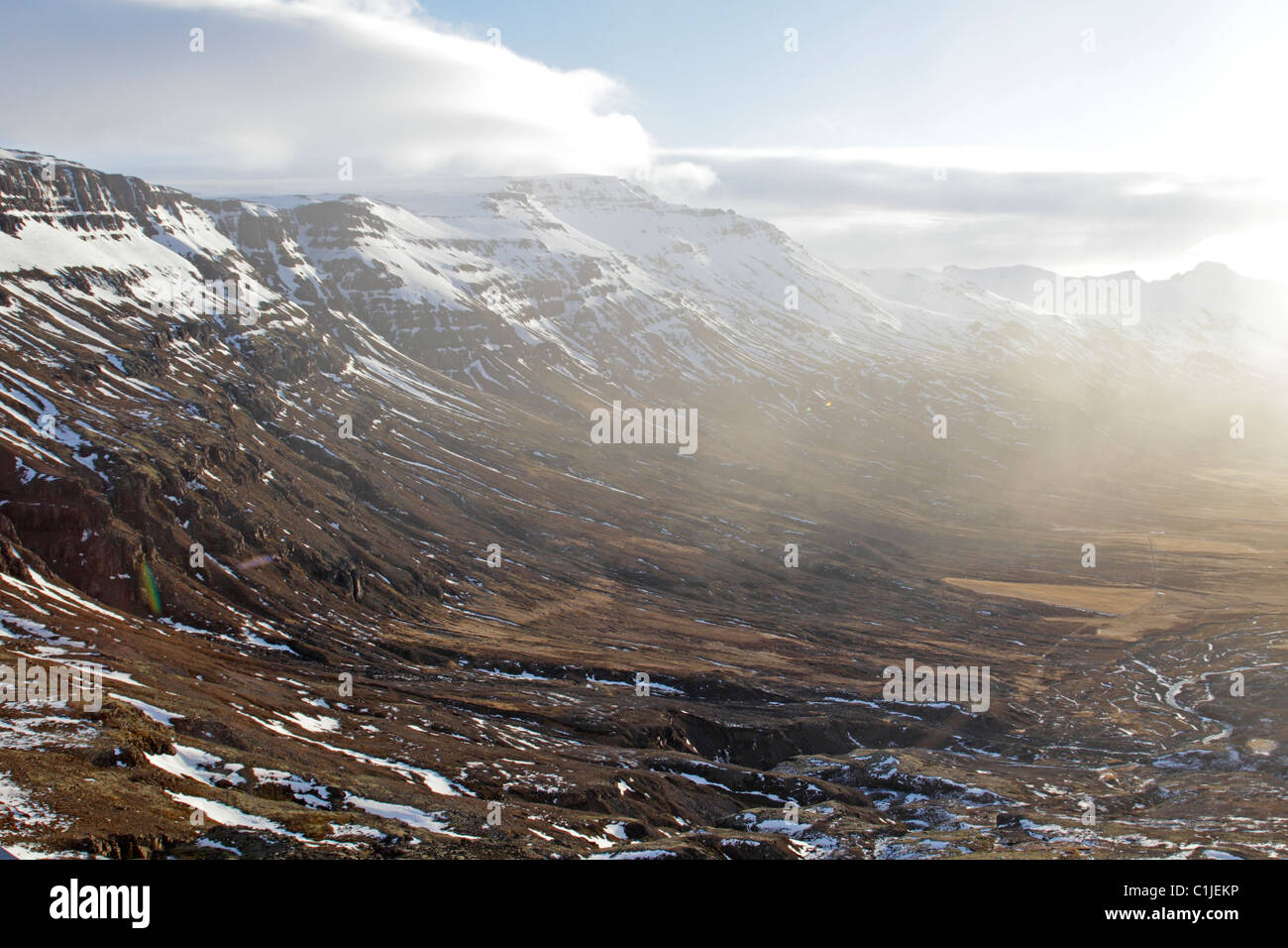 View down a snow covered valley in eastern iceland in winter Stock Photo