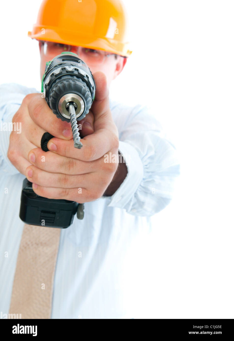 crazy man builder with a drill Stock Photo Alamy
