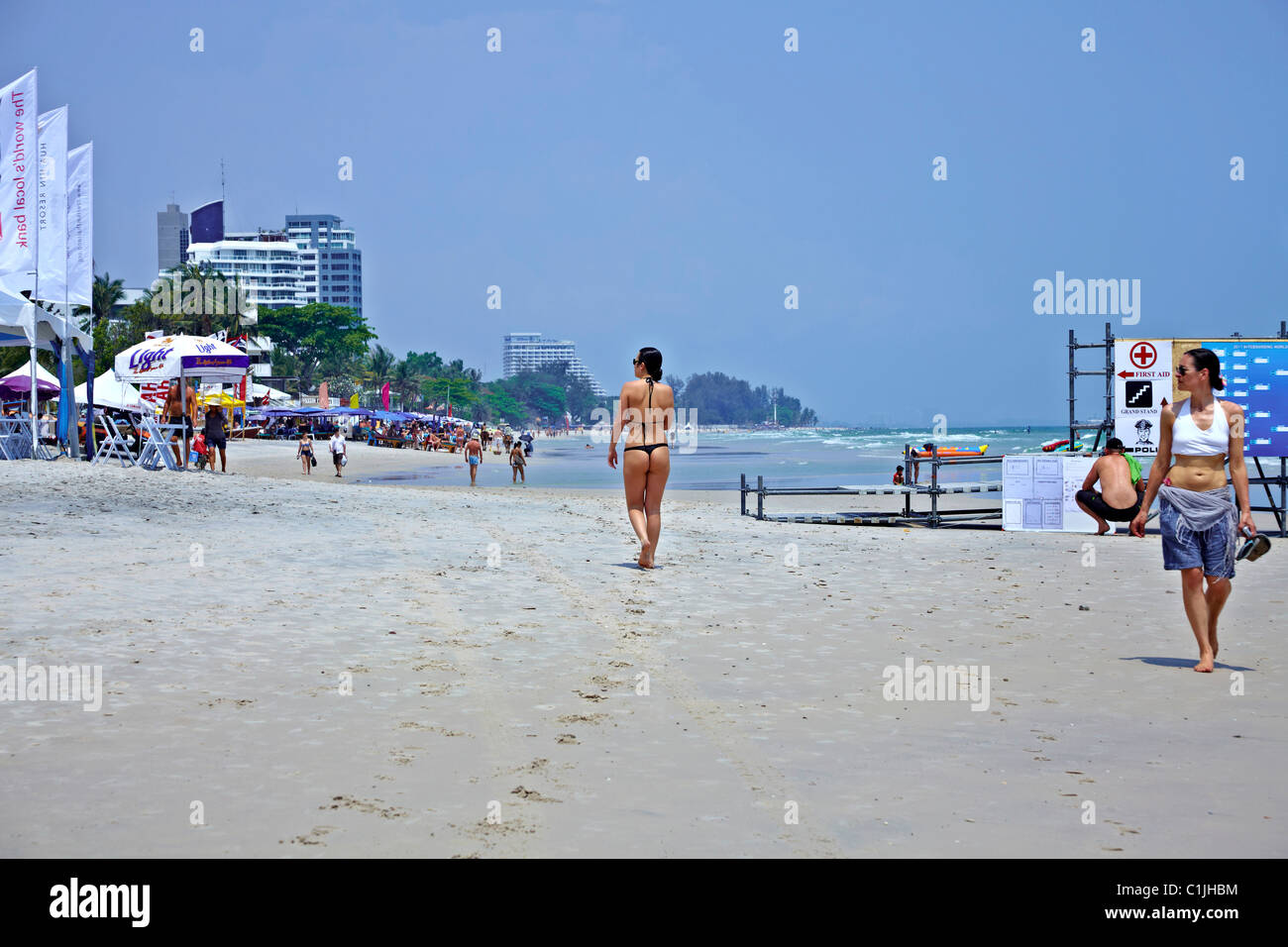 Hua Hin beach and female wearing a skimpy thong bikini. Thailand S E Asia  Stock Photo - Alamy