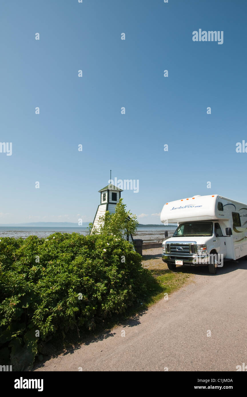 Quebec, Canada. Motorhome at lighthouse along the St. Lawrence River in Kamouraska. Stock Photo