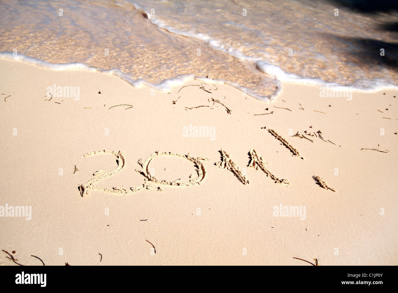 The inscription on the sandy caribbean beach - 2011, background Stock ...