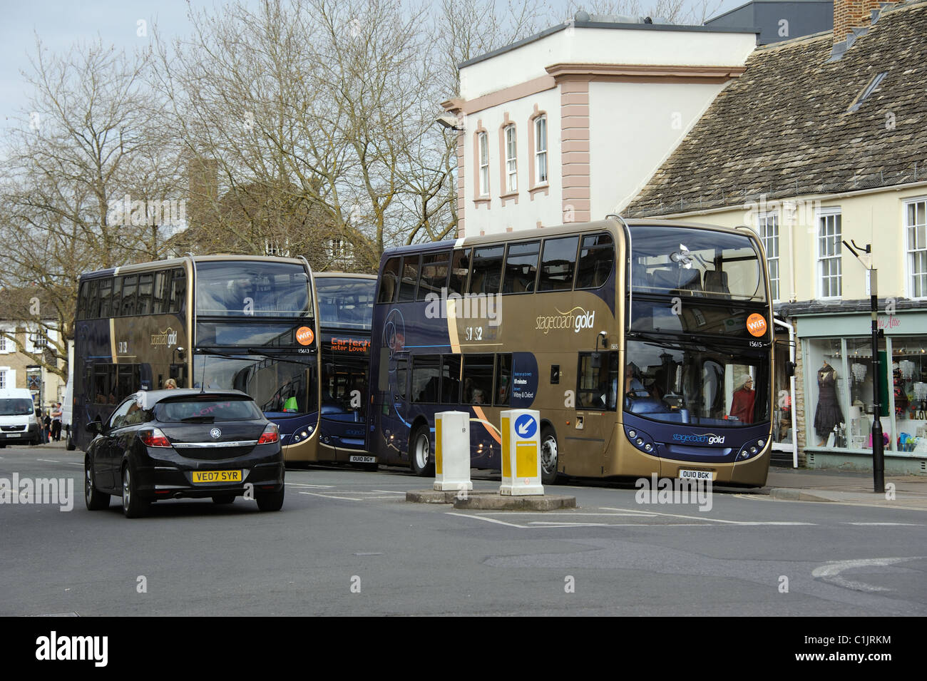 Stagecoach Gold company double decker buses in Witney town centre Oxfordshire England UK The new buses were introduced in March Stock Photo