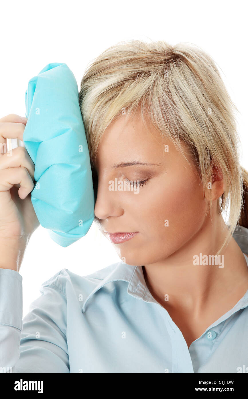 Woman with ice bag for headaches and migraines Stock Photo Alamy