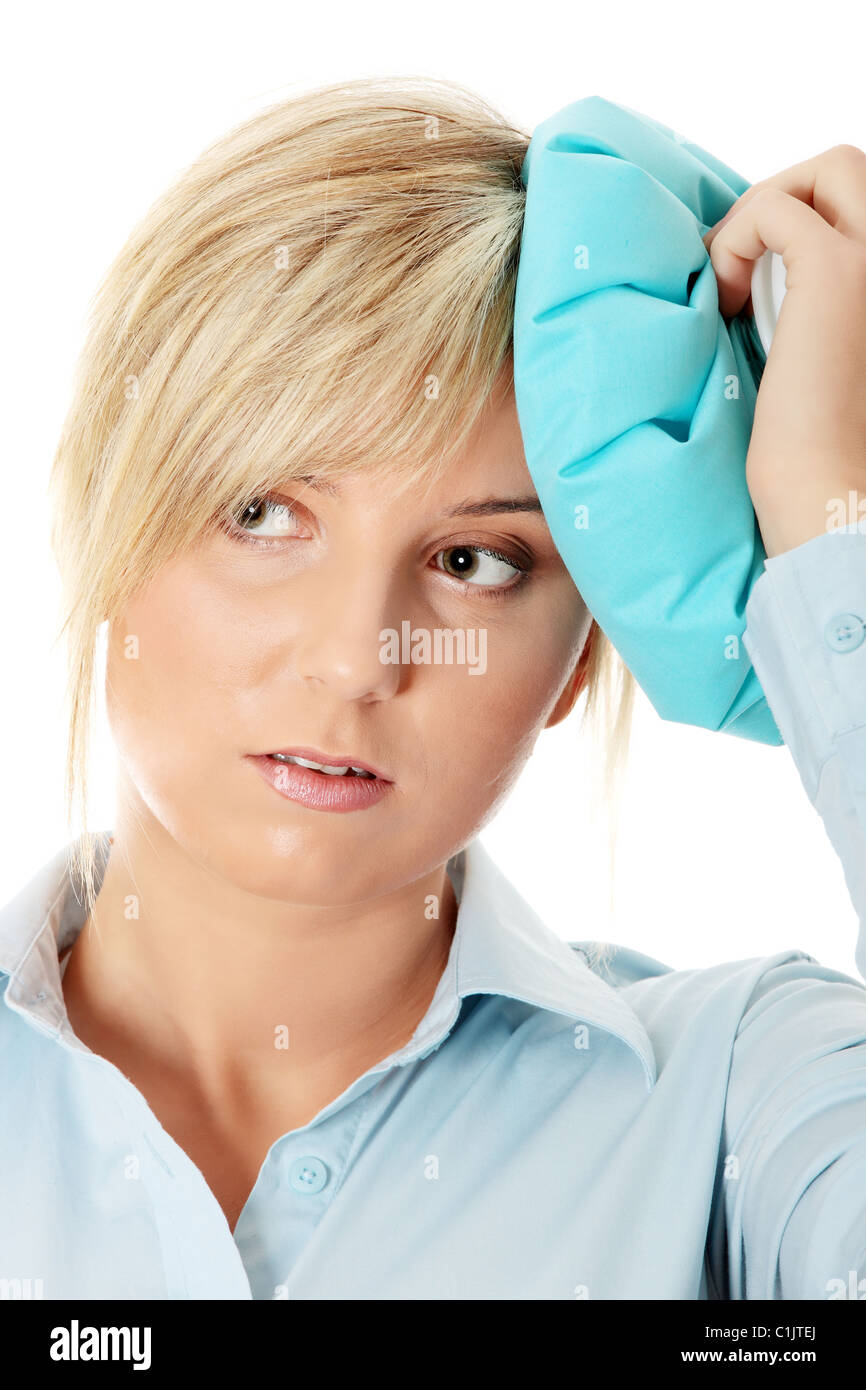 Woman with ice bag for headaches and migraines Stock Photo Alamy
