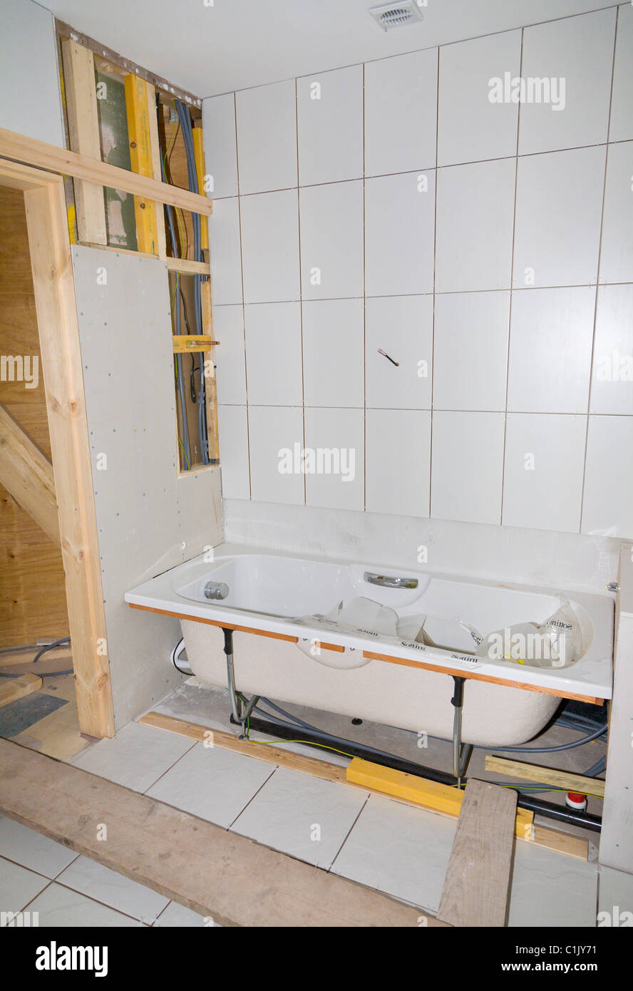 Putting in a new bathroom Stock Photo