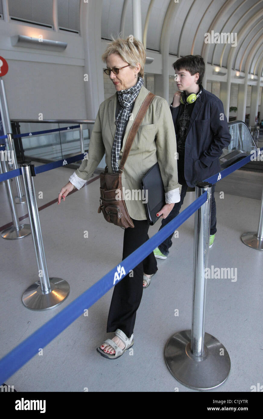 Annette Bening and her son Benjamin Bening arrives at LAX to catch a