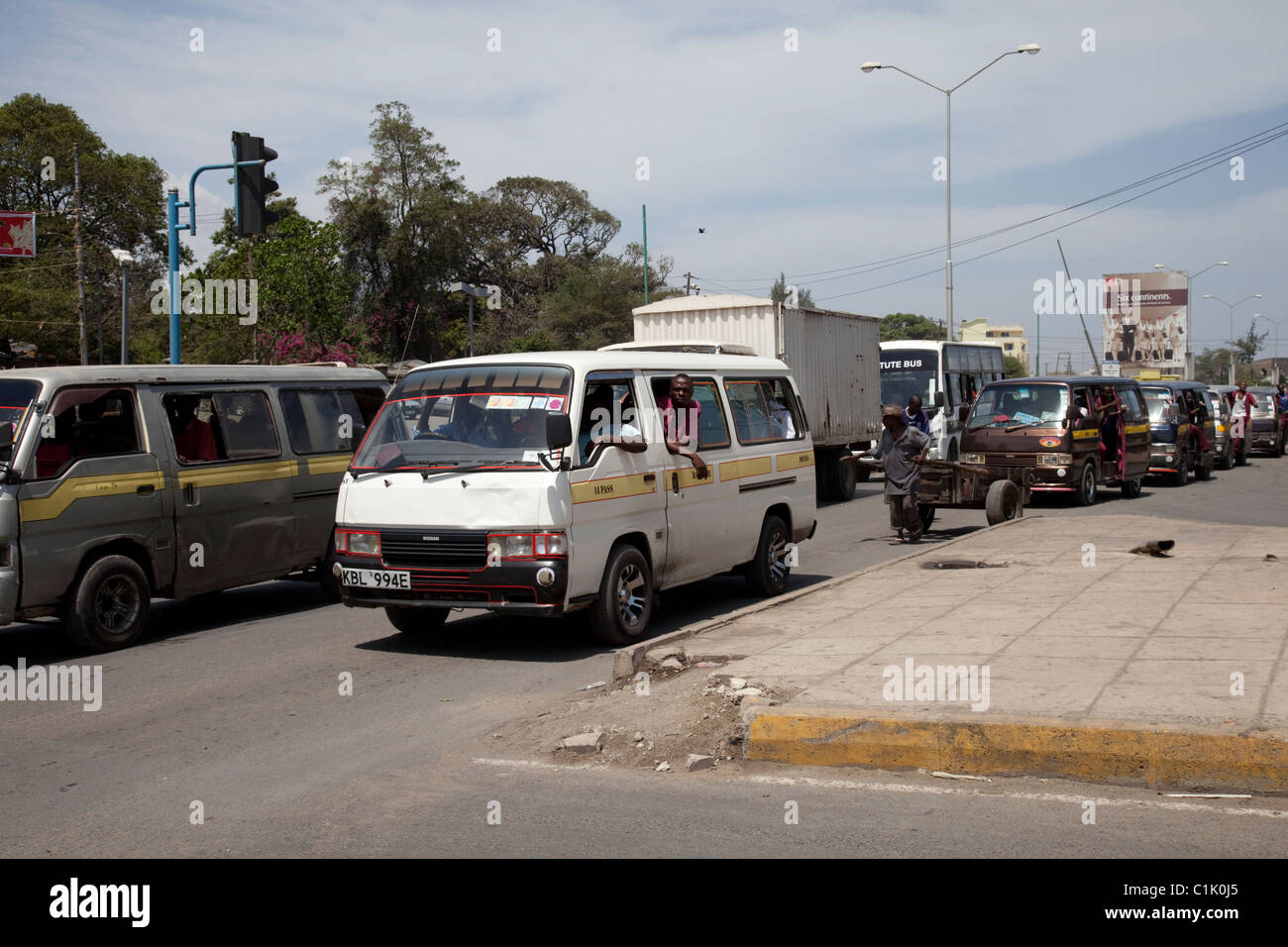 Local Matatu taxis casual street scene Mombasa Kenya Stock Photo