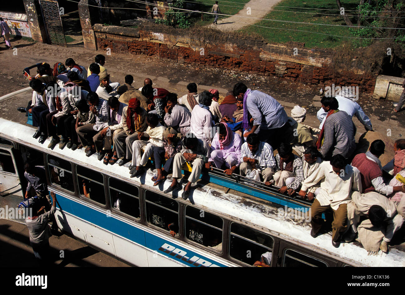 India, Bihar, Grand Trunk Road, Sasaram city, passengers on a bus roof Stock Photo