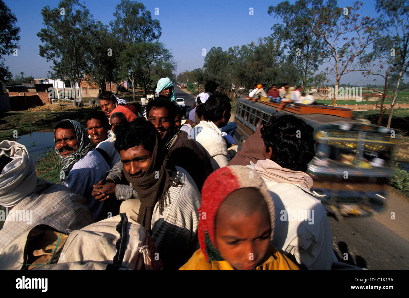 Indian people on a bus roof hi-res stock photography and images - Alamy