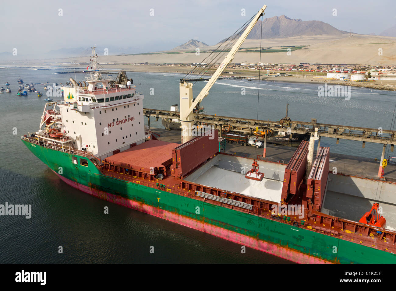 Cargo ship being unloaded at the port of Salaverry, Trujillo, Peru Stock Photo