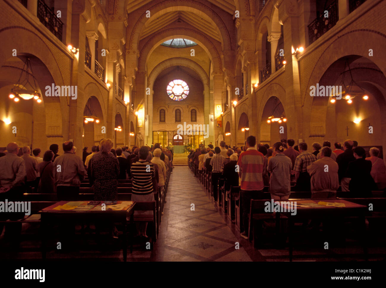French people person at Sunday mass Saint Antoine Church city of Paris Ile-de-France region France Europe Stock Photo