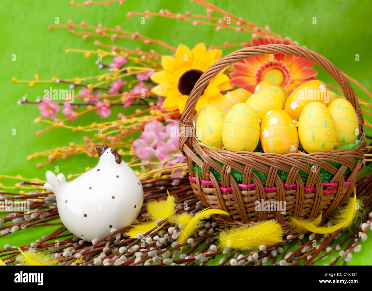 Basket full of Easter eggs and flower Stock Photo Alamy