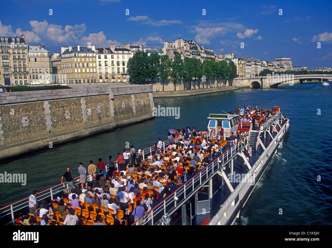 people, tourists, sightseeing, boat cruise, Seine River, Paris, Ile-de-France, France, Europe Stock Photo