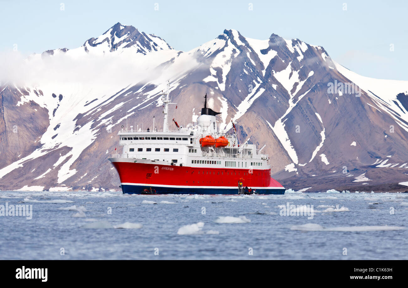 Passengers boarding ship from Zodiac raft, Spitsbergen, Norway Stock Photo