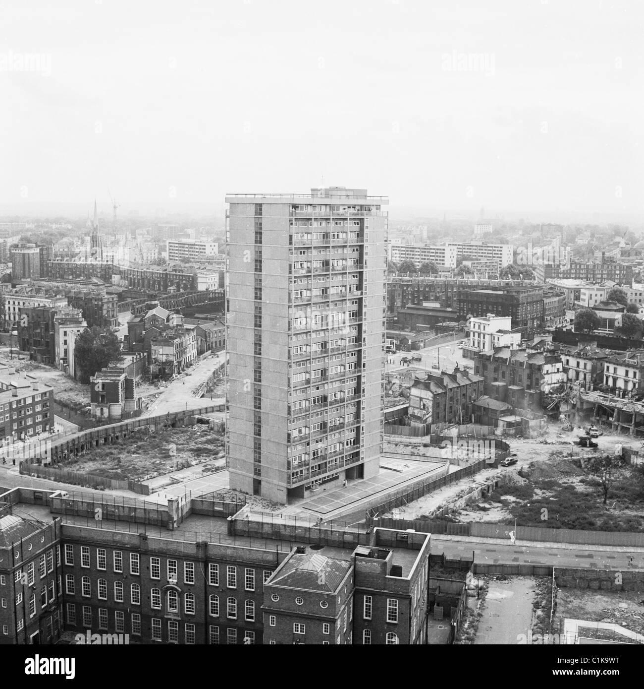 1960s. London. A newly constructed high rise residential tower block, built to provide volume housing on empty WWII bomb sites. Stock Photo