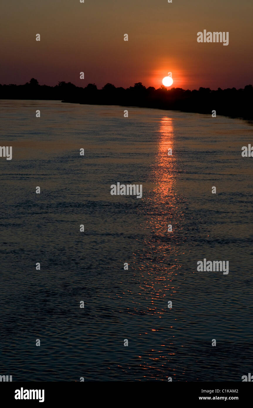 sunset on the okavango river, botswana, africa Stock Photo