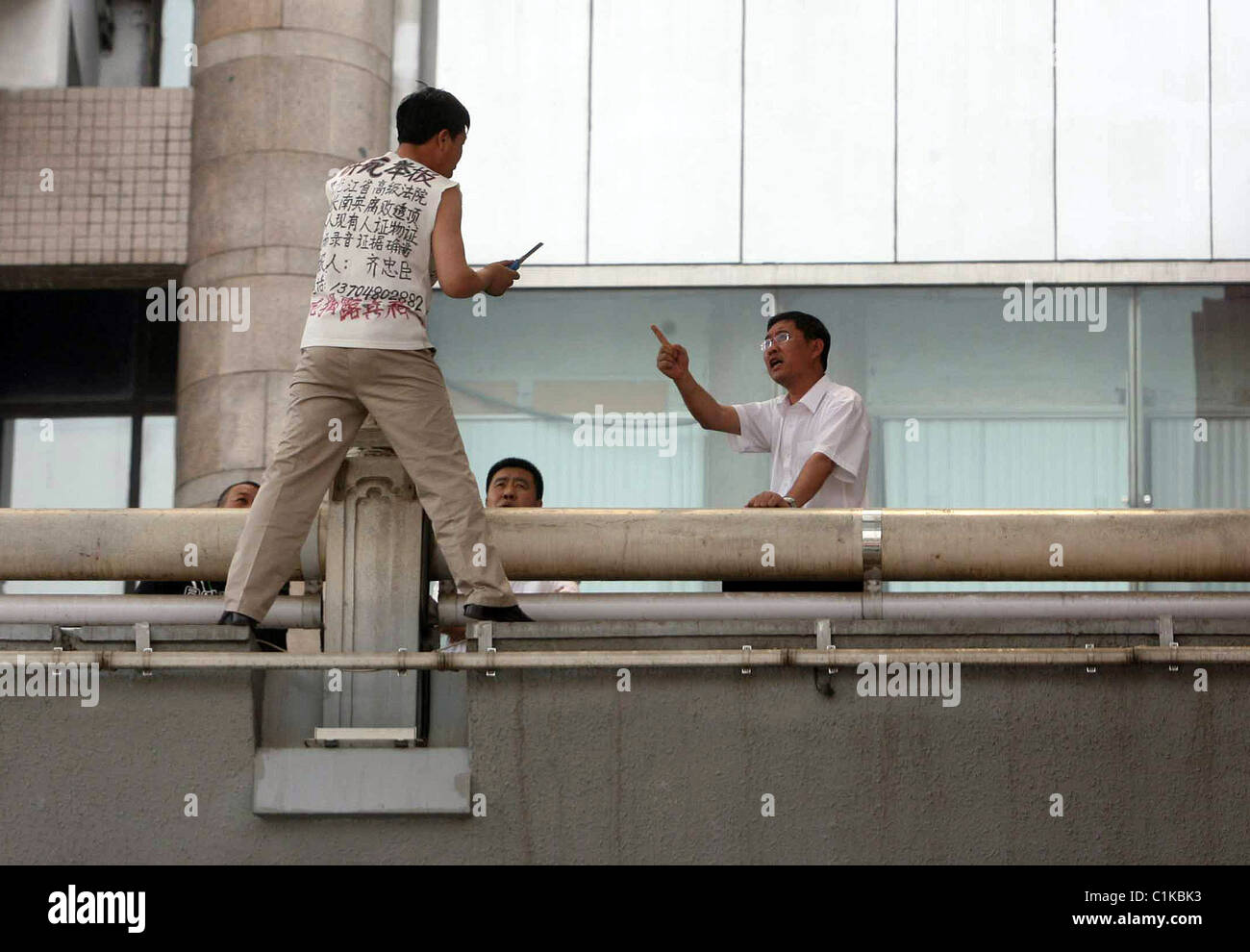 GRASS IN SUICIDE HORROR A man slashes his wrists and plunges 40ft in a