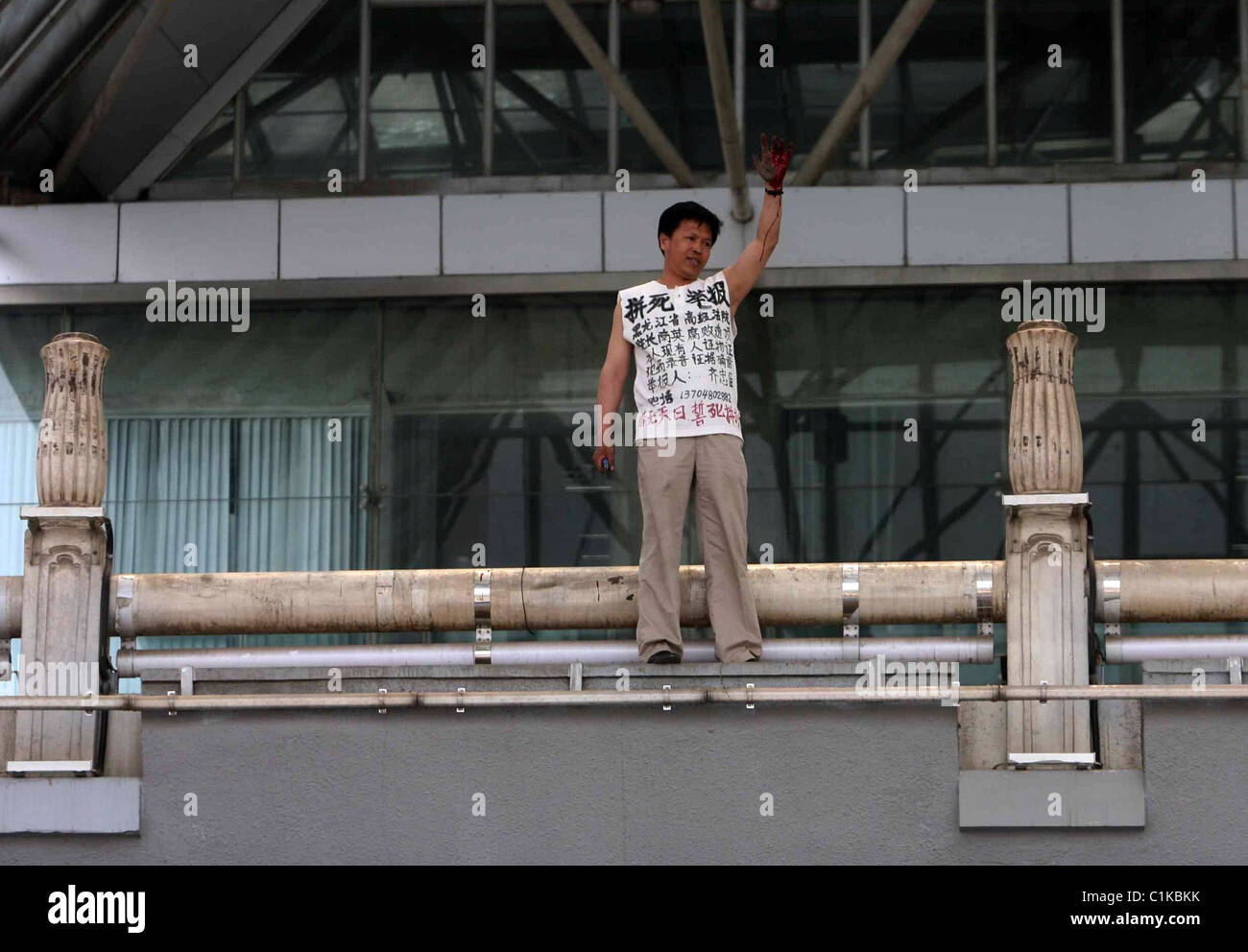 GRASS IN SUICIDE HORROR A man slashes his wrists and plunges 40ft in a