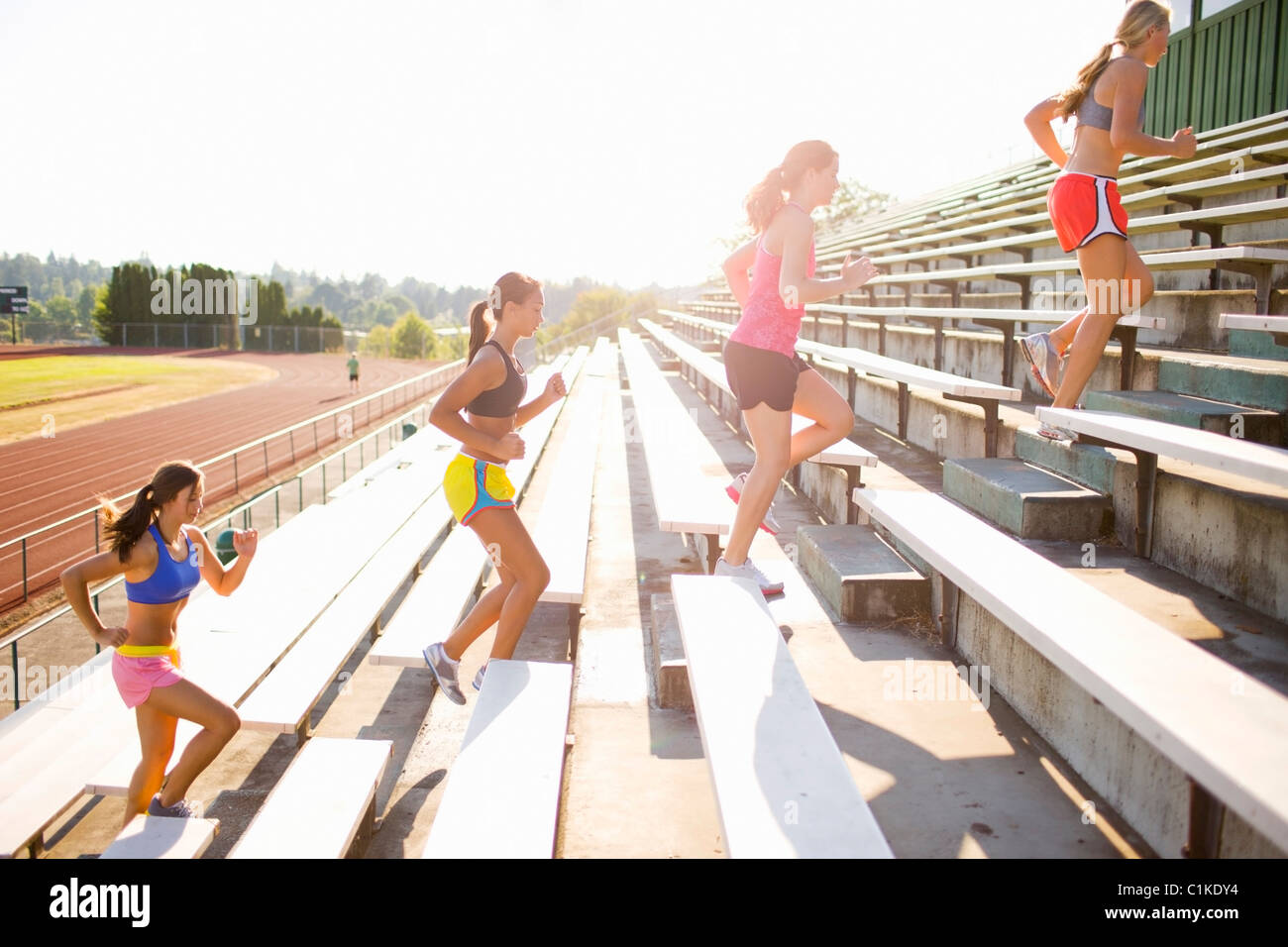 Track field runner bleacher hires stock photography and images Alamy