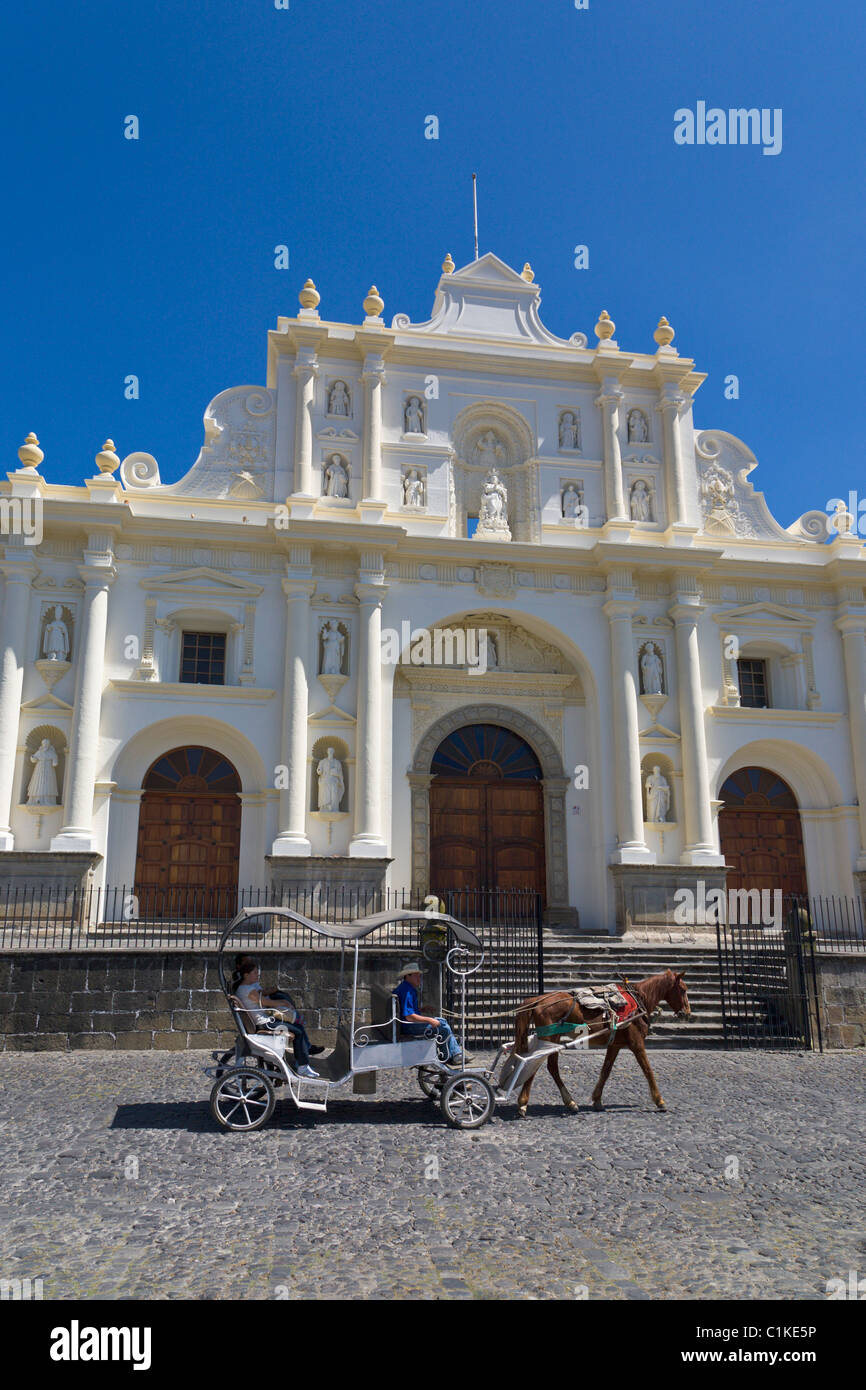 Horse and carriage ride outside the San Jose Cathedral, Antigua, Guatemala Stock Photo