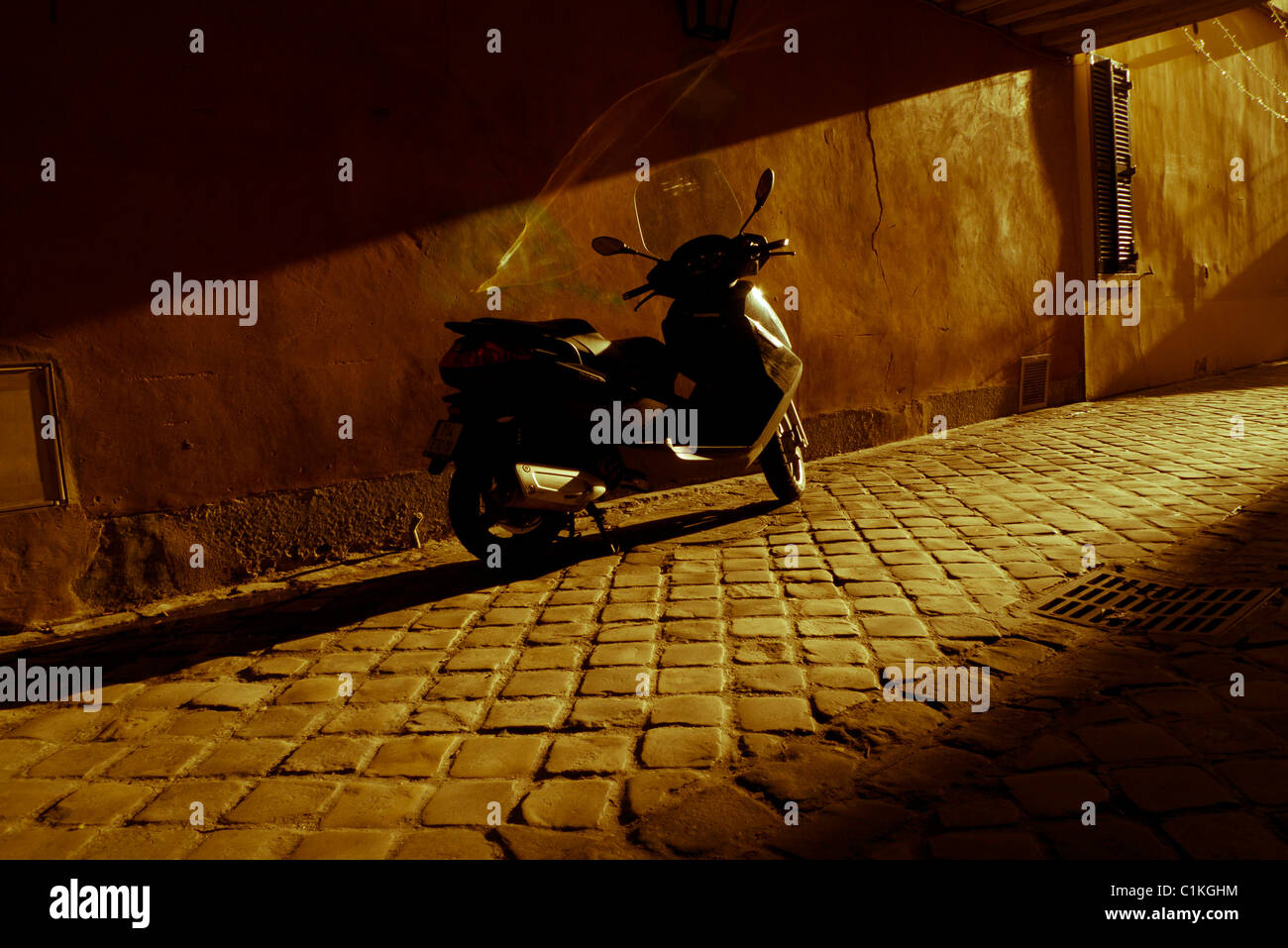 Motorbike in alleyway, Versailles, france Stock Photo