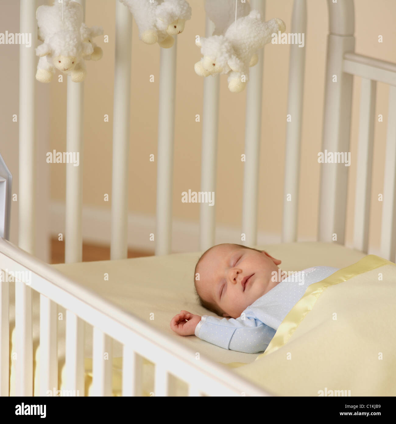 Sleeping Baby In Crib Stock Photo Alamy
