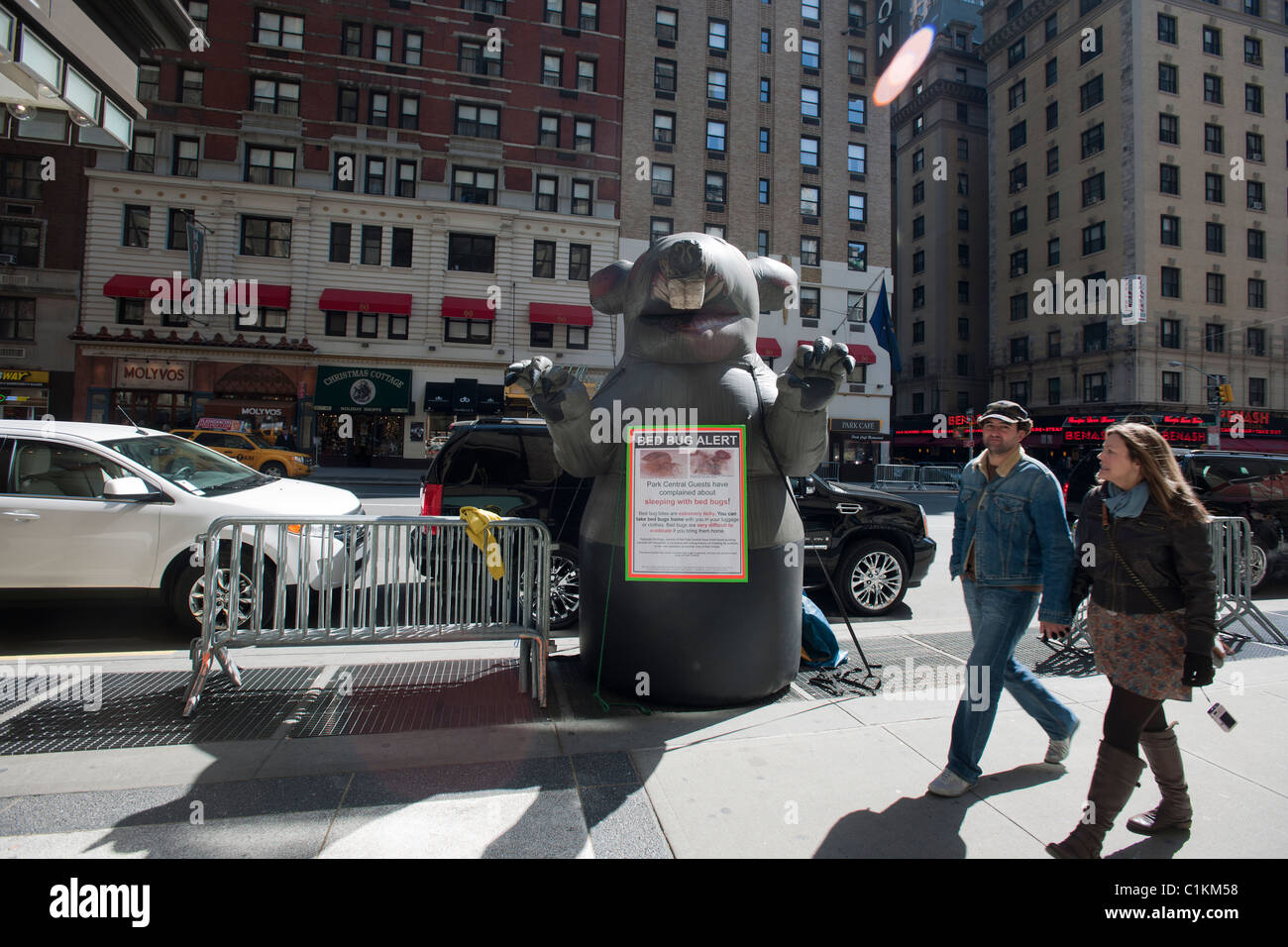 A giant inflatable rat outside the Park Central Hotel protests non