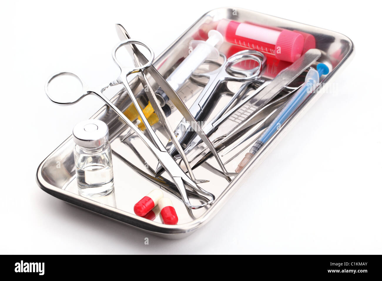 Medical instruments in a steel tray Stock Photo