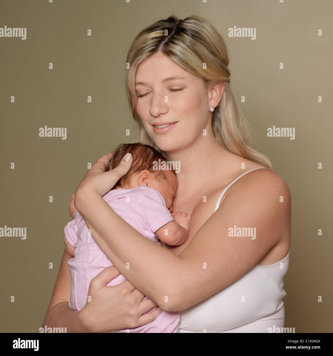 Mother Holding Newborn Baby Stock Photo Alamy