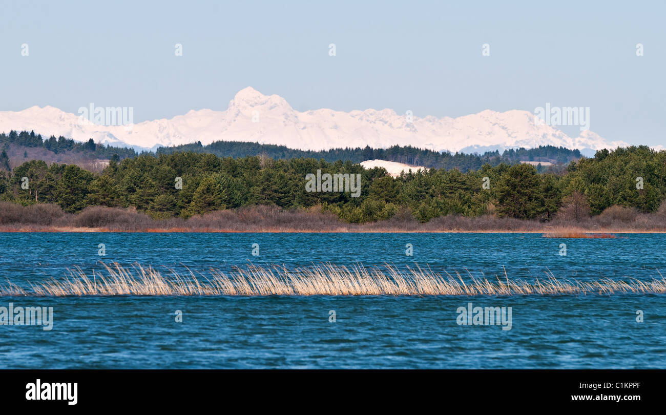 Triglav and Julian Alps seen from Cerknica lake Stock Photo
