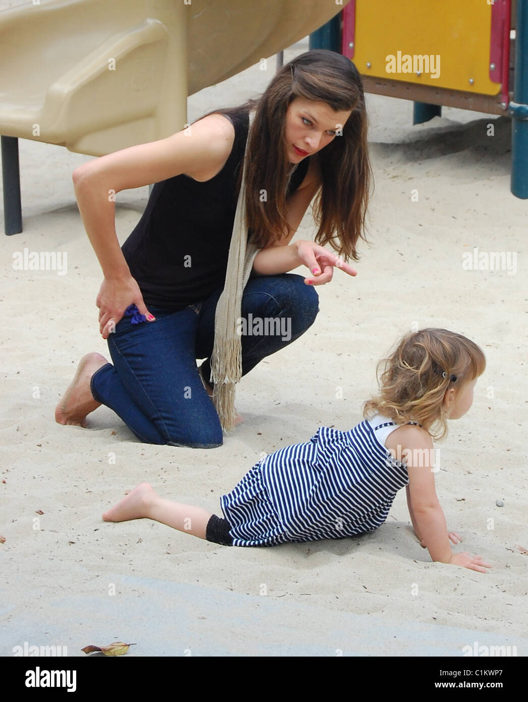 Milla Jovovich plays with her daughter, Ever Gabo Anderson at Beverly