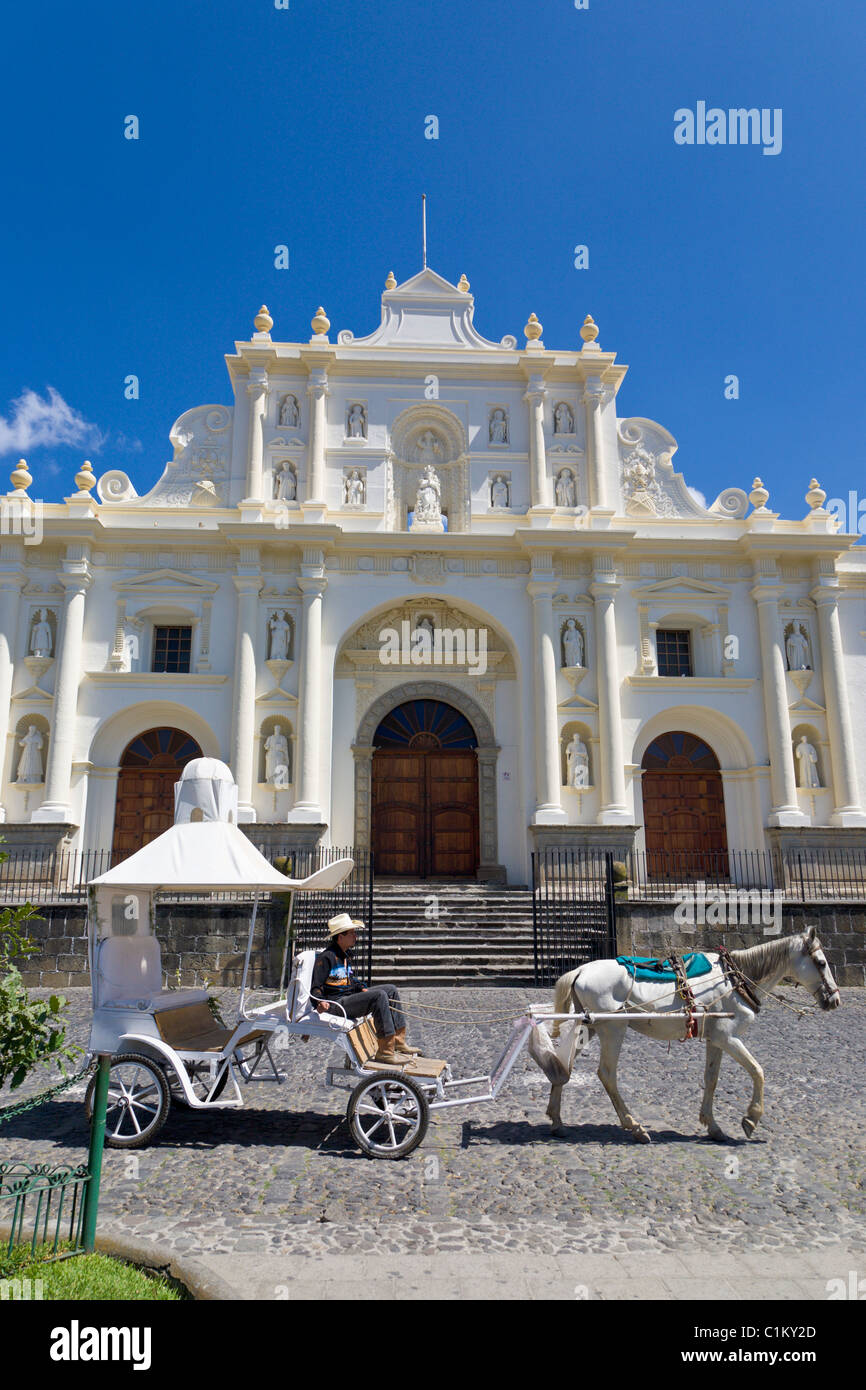 Horse and carriage ride outside the San Jose, Cathedral, Antigua, Guatemala Stock Photo