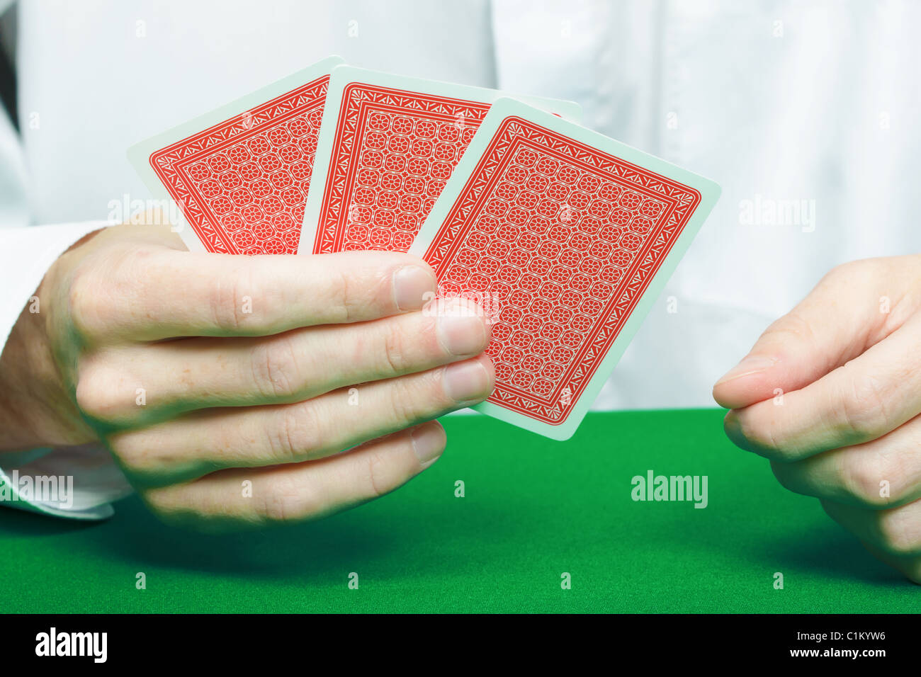 cards in the hands of gamblers. Card Game Stock Photo Alamy