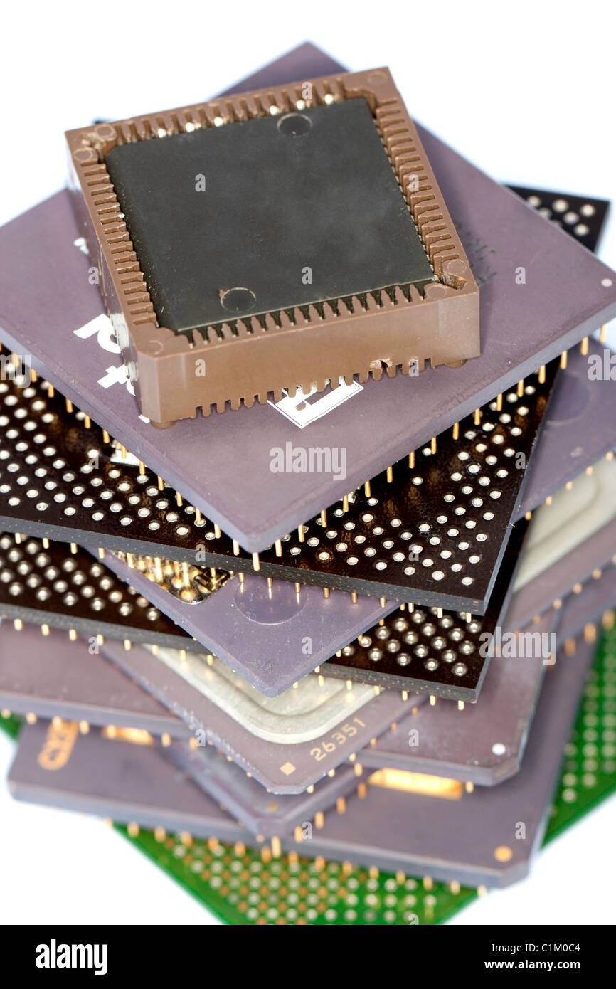 Close view detail of some computer microprocessors isolated on a white ...