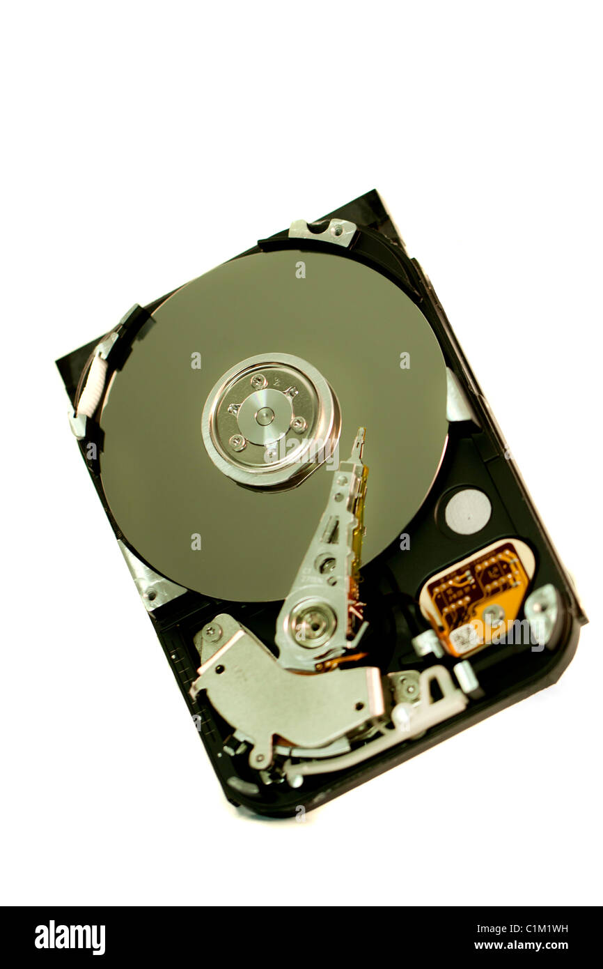 close view detail of the inside of a computer harddisk isolated on a ...