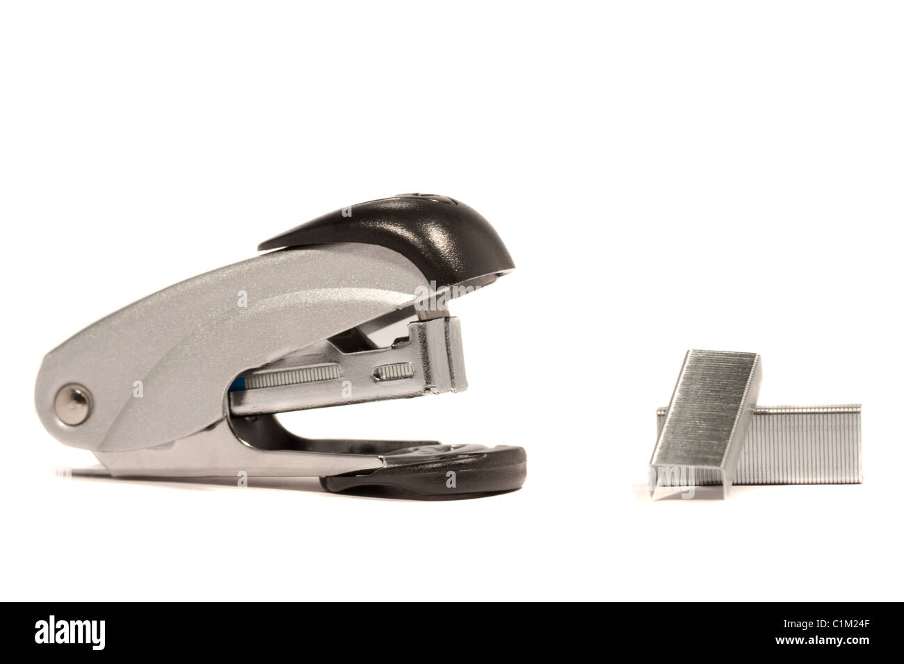 Close view detail of a stapler with staples isolated on a white ...