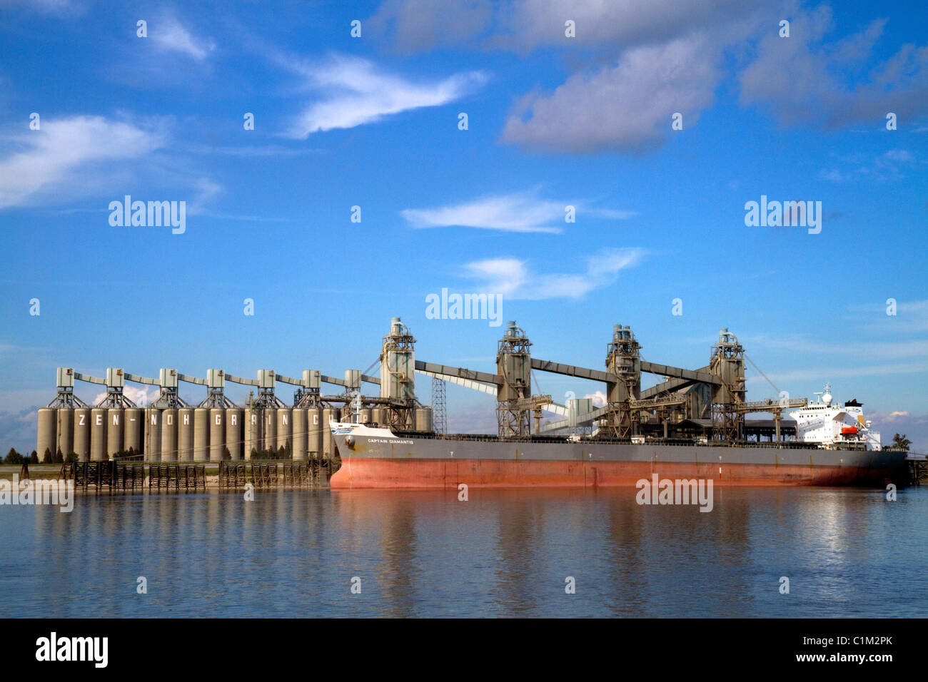 Bulk freighter at a grain shipping terminal on the Mississippi River at the Port of Baton Rouge, Louisiana, USA. Stock Photo