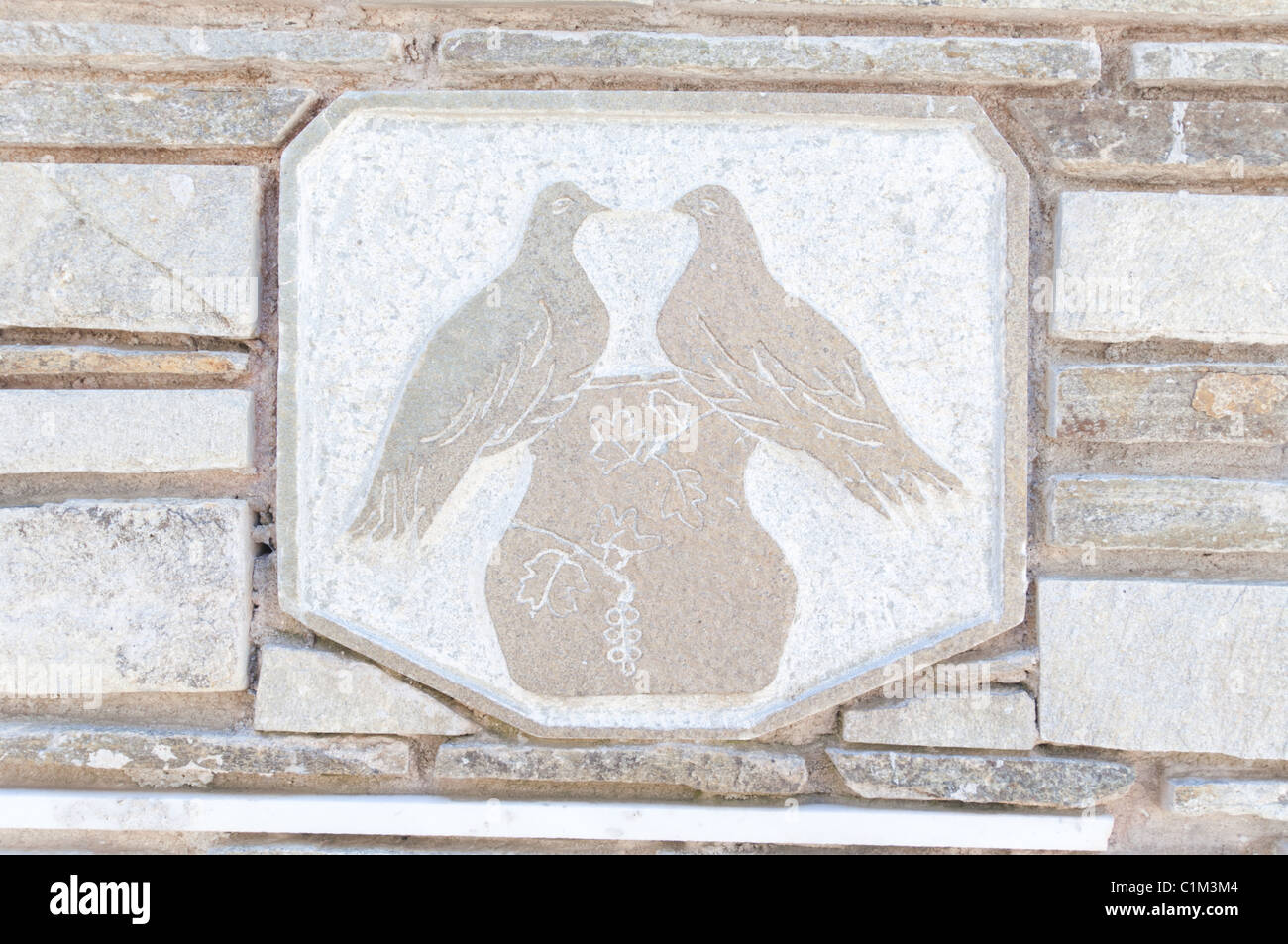 Stone carving with religious significance from a monastery near the city of Nafpaktos, Greece. Stock Photo