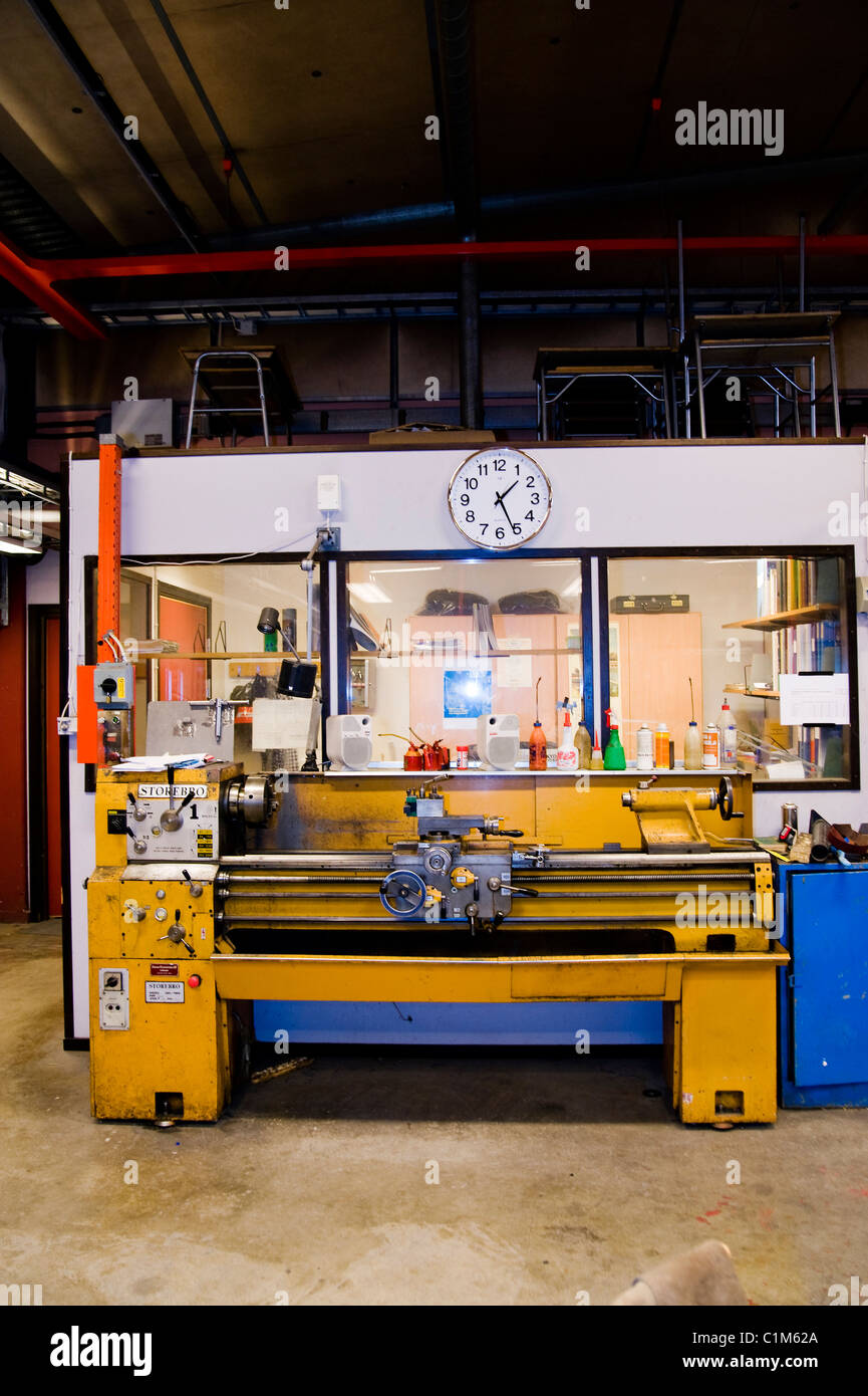 Engineering school, clock, machines, works Stock Photo Alamy