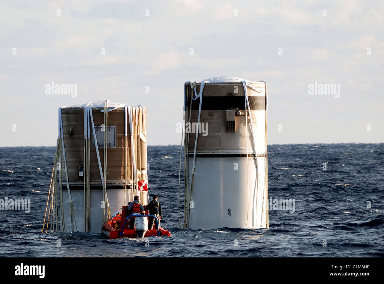 Space Shuttle solid rocket boosters being retrieved from the Atlantic Ocean Stock Photo