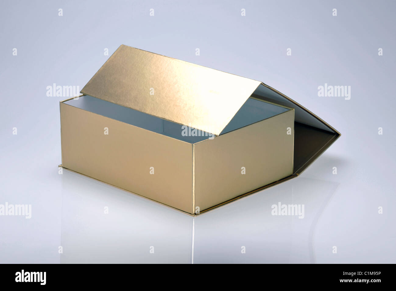 Open, magnetic gold box, empty Stock Photo