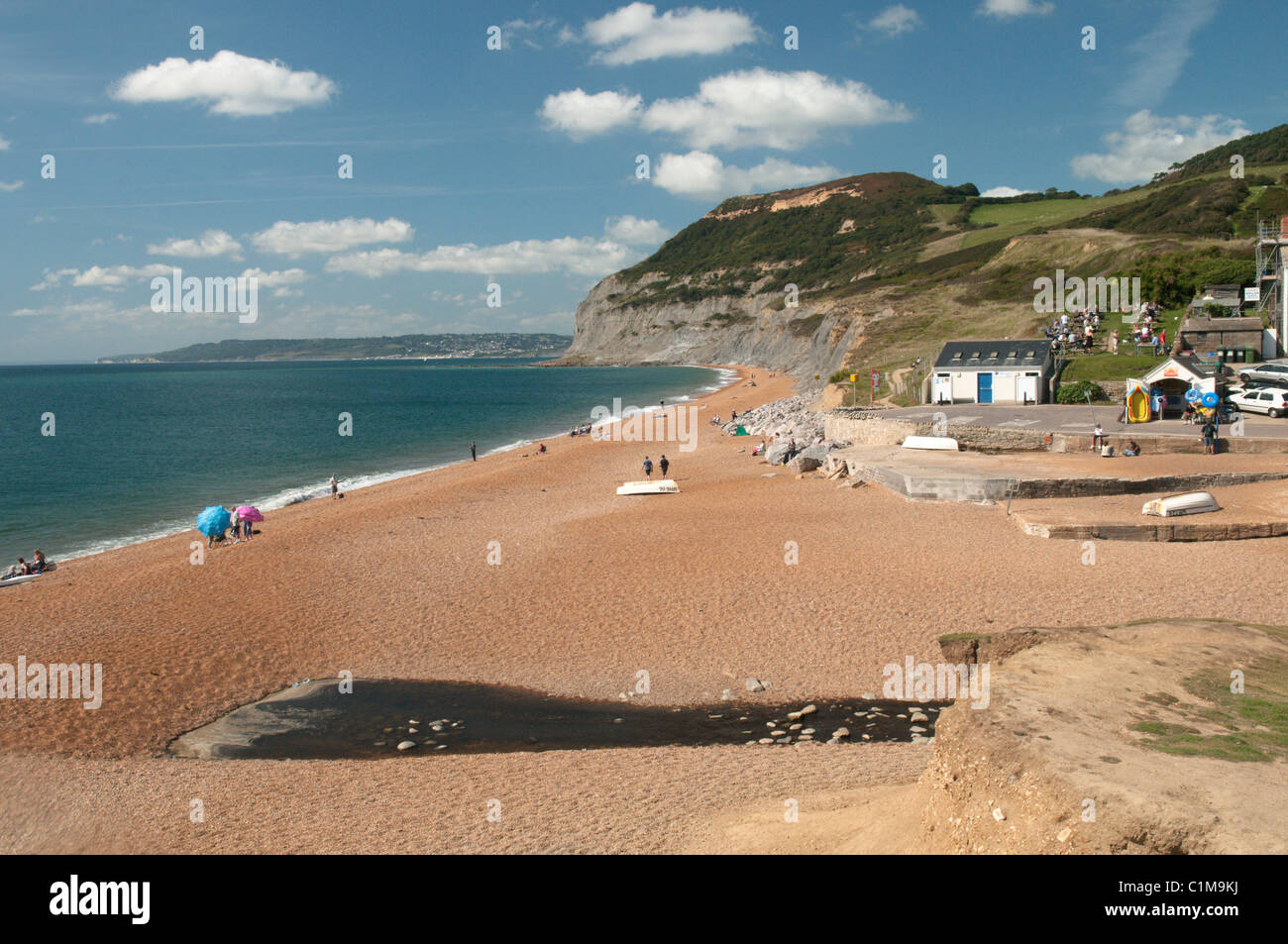 The pea-shingle beach at Seatown, near Bridport, Dorset, UK. View west to Golden Cap, highest point on south coast. Stock Photo