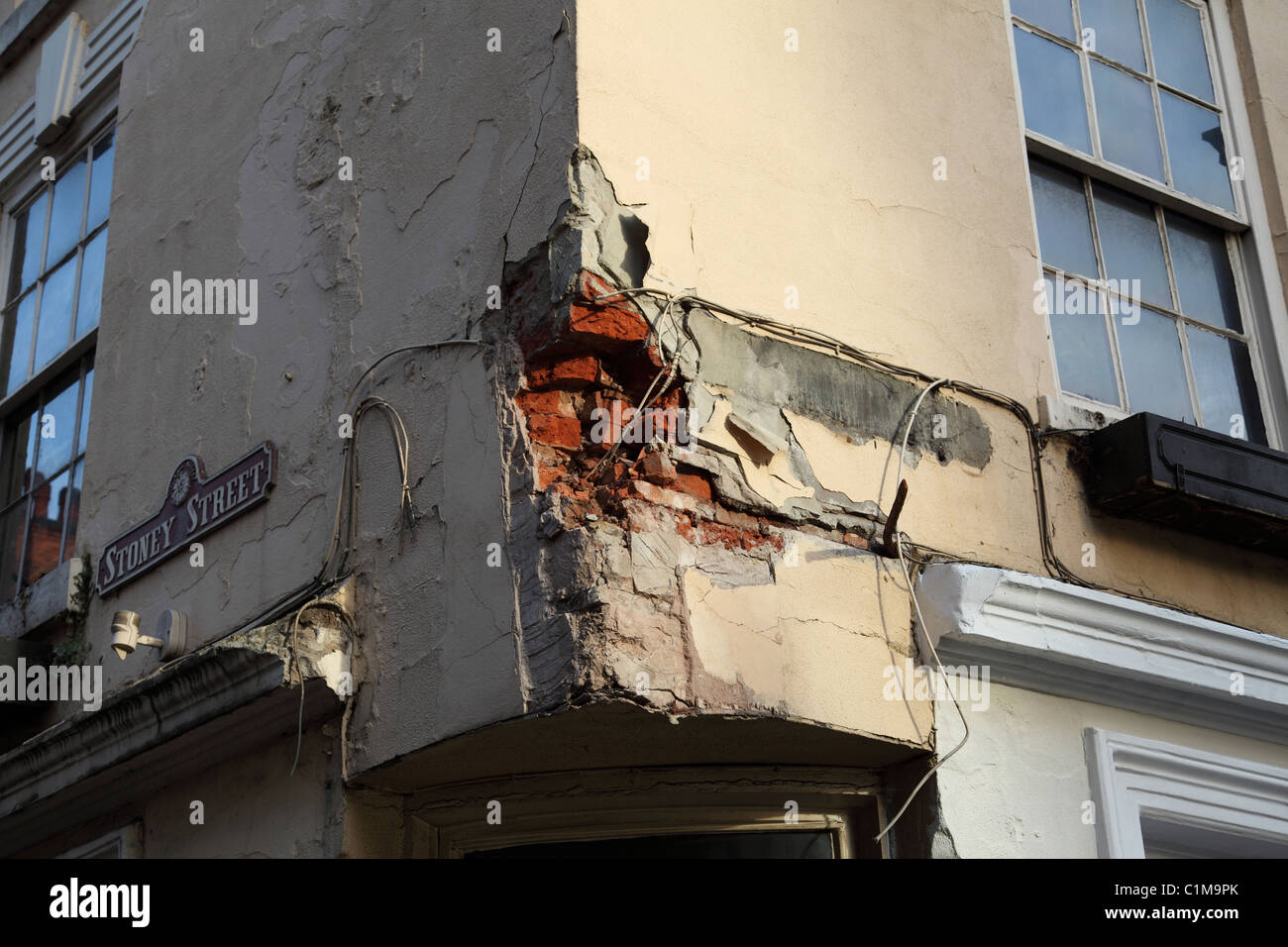 Damaged brickwork on a building in a U.K. city. Stock Photo